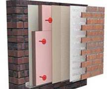 Isolering för ytterväggar i ett hus: typer av värmeisolering och egenskaper hos material